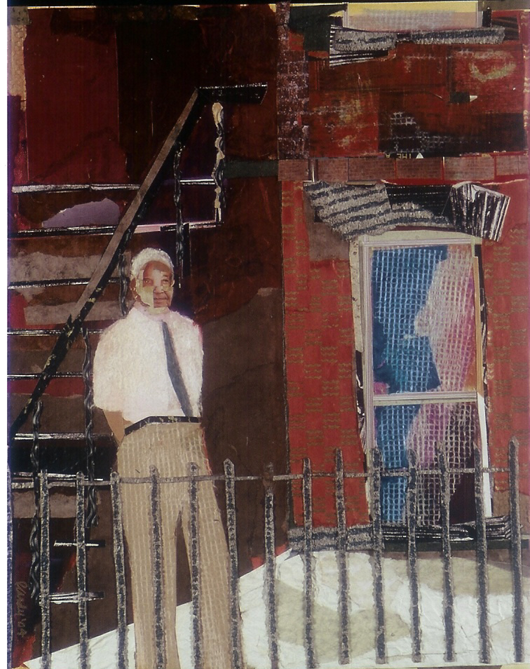 A man standing in front of stairs and a door.